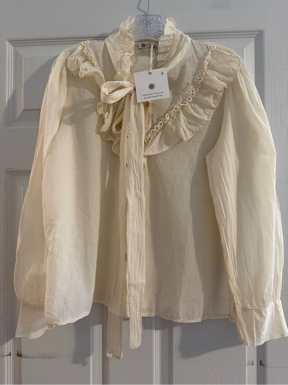 Tie-Neck Ruffle Blouse in Cream